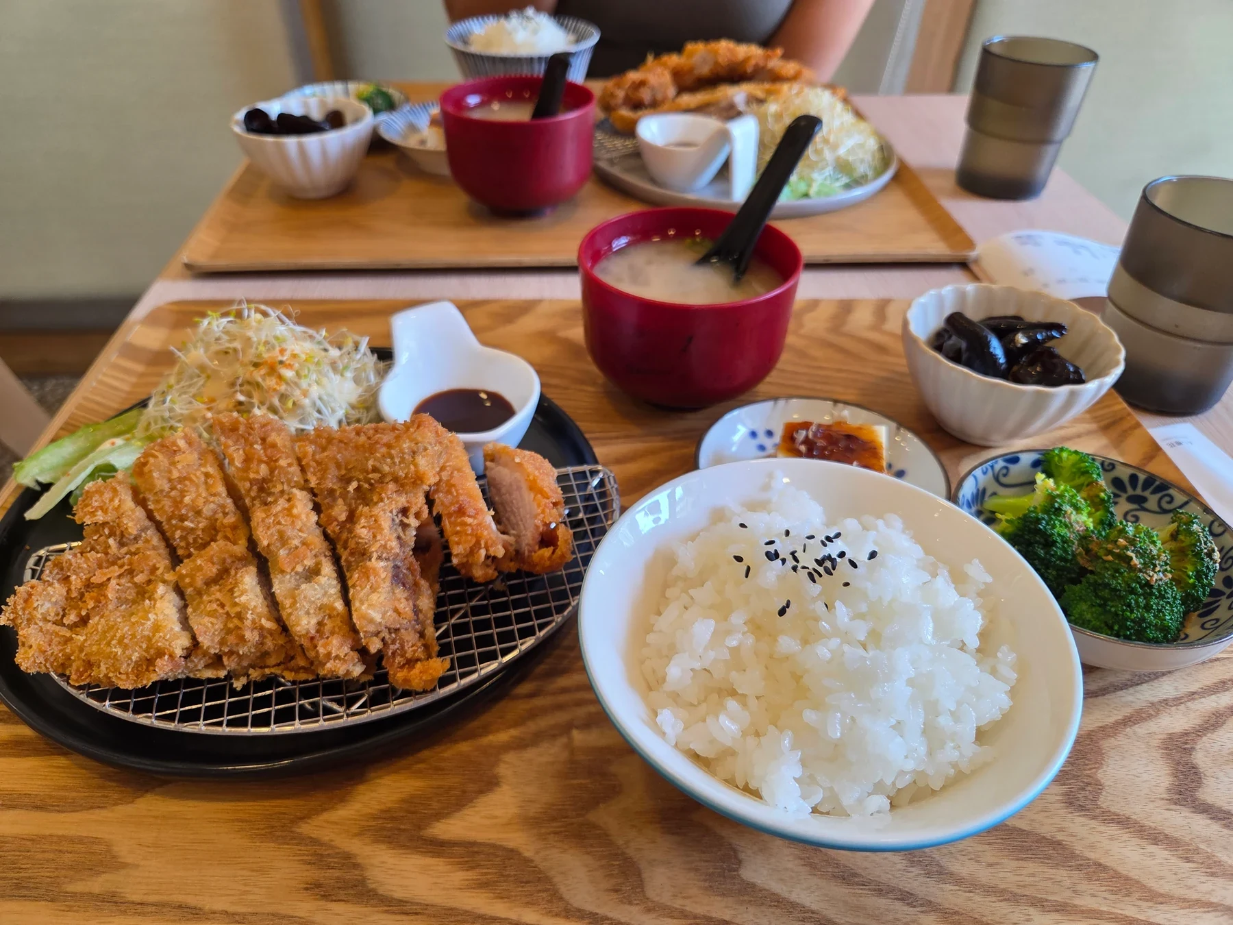 Tonkatsu sets with rice, cabbage, soup and side dishes at Akira