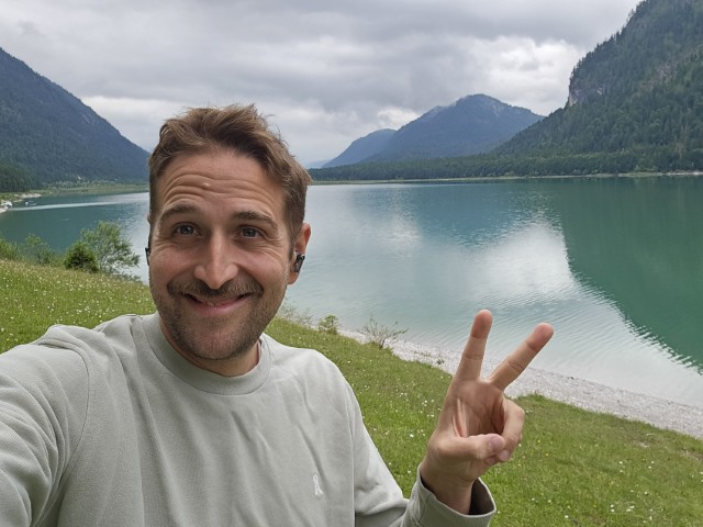 photo of me at a lake grinning haha